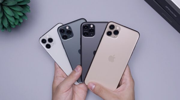 Photo by Daniel Romero two space gray and two silver iPhone 11's
